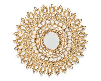 1498
20th century
A Peruvian giltwood wall mirror
The ornately decorated giltwood mirror with slightly oval center mirror issuing many floral motif spokes with mirrored segments
35.5" H x 33.5" W x 2.75" D
Estimate: $300 - $500