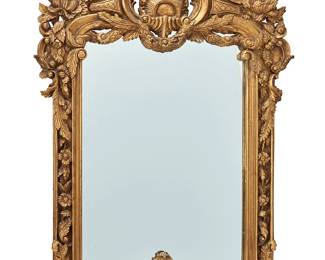 1496
20th century
A Baroque-style giltwood mirror
The large ornate giltwood frame with garlands, rocaille, acanthus leaves, and scrolled motifs
59" H x 38.5" W x 2" D
Estimate: $800 - $1,200