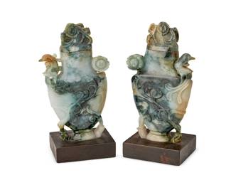 1376
19th century or later
A pair of Chinese carved hardstone lidded vases
Each unmarked
The carved mottled hardstone vases floral motif to body and avian motif to shoulder, mounted to later wood bases, 2 pieces
Each vase: 6" H x 1.25" D; Each base: 0.875" H x 3" W x 2.5" D
Estimate: $200 - $300