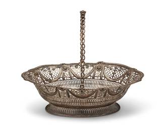 1321
1774
An English sterling silver handled basket
Marked for sterling and for London; date marked for 1774; maker's mark: WP [likely William Plummer]
The footed basket with swing handle, featuring openwork and repoussé foliate motifs and beaded rim
Stored: 4.5" H x 13.25" W x 11" W
21 oz. troy approximately
Estimate: $400 - $600