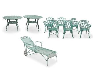 1504
Late 20th century
A Coalbrookdale-style cast aluminum patio suite
The Victorian-style outdoor set, each painted green, comprising two rounded tables with open scrollwork (Taller: 28.75" H x 40.75" Dia.), six conforming chairs (Each: 30.75" H x 22" W x 23" D), and one lounge chair set on wheels (24.75" H x 75.75" W x 28" D), 9 pieces
Estimate: $700 - $900