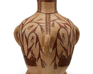 1432
20th century
A Mexican Guerrero pottery vessel
The three-handled water jar raised on three legs, featuring red and brown painted birds over a white slip ground
11" H x 7.25" Dia. approximately
Estimate: $50 - $80