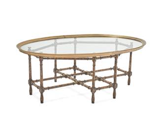 1479
Early 20th century
A Baker faux bamboo glass top coffee table
Unmarked
The elongated octagonal table of patinated turned wood construction, surmounted by a glass top with brass rim, 2 pieces
Overall: 16.25" H x 22.5" W x 30.5" D
Estimate: $300 - $500