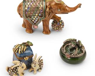 1354
Late 20th century
A group of Jay Strongwater figural trinket boxes
Each marked for Jay Strongwater
The diminutive polychrome enameled and Swarovski crystal-mounted items, comprising an elephant figure with removeable harness, a lidded circular box with frog figure mounted to lid, and a box with hinged lid and two anterior rabbit figures, two housed in original box, 3 pieces
Largest figure: 2.125" H x 2.875" W x 1.125" D; Largest box: 2.375" H x 4.125" W x 4.125" D
Estimate: $50 - $70