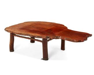 1469
20th century
A rustic walnut burlwood table
The tabletop with mostly live edges, raised on natural wood legs joined by a box stretcher
16.5" H x 60.5" W x 39.25" D
Estimate: $400 - $600