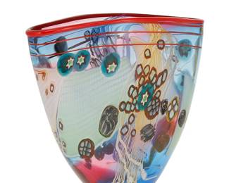 1448
Wes Hunting (b. 1958)
An art glass vase, late 20th century
With acid-etched signature near base: WS Hunting
The vase with murrini and applied glass accents
9.75" H x 10.25" W x 4.25" D
Estimate: $300 - $500