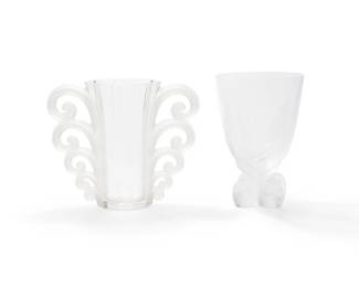1345
Mid-20th century
Two Lalique glass vases
Each with etched script mark: Lalique France
"Beauvais" vase designed 1931 by René Lalique (1860-1945)
The molded and cut glass vases, comprising a "Beauvais" vase and an "Osmonde" vase, 2 pieces
Beauvais: 7.625" H x 9.375" W x 4.5" D; Osmonde: 8" H x 5.5" Dia.
Estimate: $200 - $300