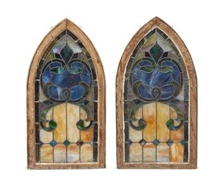 1509
Circa 1890
A pair of leaded glass windows
Each depicting foliate motifs and contained in arched wood, 2 pieces
Each: 38" H x 20" W x 1.75" D
Estimate: $300 - $500