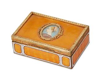 1355
Early 20th century
A French gilt metal and enamel trinket box
Unmarked
The gilt metal hinged box with bejeweled upper edge enameled top and panels, featuring a painted portrait in profile set in a bejeweled gilt metal frame
1.375" H x 3.875" W x 2.75" D
Estimate: $300 - $500