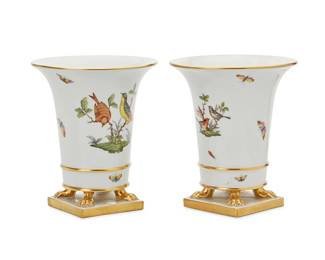 1360
Mid/late 20th century
A pair of Herend porcelain "Rothschild Bird" vases
Each marked in blue: Herend / Hungary / Handpainted / G433/120 / 67-A
The vases with painted avian motifs and gilt accents, raised on paw feet and a square base, 2 pieces
Each: 7.125" H x 6.125" Dia.
Estimate: $200 - $300