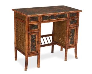 1501
Early/mid-20th century
An chinoiserie bamboo writing desk
The ebonized wood desk with painted and gilt arboreal and avian motifs to top and drawers panels, side and back panels gilt-mounted with foliate motifs in relief, featuring five drawers and opposed small hinged cabinets, each revealing two shelves, the sides joined by a ladder-form stretcher
30.75" H x 37" W x 19" D
Estimate: $600 - $800