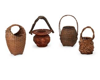 1400
20th century or later
A group of Japanese ikebana baskets
Comprising four woven bamboo and wood handled baskets of various shapes and sizes including a chunky globular basket with flanged rim and lavine branch handles, a delicate tall handled basket with twined root accent, and two baskets woven with striped bamboo strips, one small with irregular protruding bumps and one tapered with round openings to each side, 4 pieces
Largest: 16" H x 10.5" Dia.; Smallest: 12.75" H x 9" W x 8.5" D
Estimate: $300 - $500