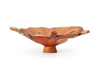 1459
Mid/late 20th century
A Contemporary turned wood bowl
Signed and inscribed illegibly to underside
3.75" H x 11.5" W x 10.25" D
Estimate: $100 - $200