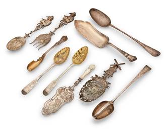 1316
Late 19th/early 20th century
A group of silver serving utensils
Each variously marked for different makers and countries of origin; some pieces marked for sterling
Comprising a metal alloy salad set with figural handles, a metal alloy decorative spoon with articulated handle, a silver pie server with mother of pearl handle, and other sterling silver utensils from Gorham and various British makers, some personalized, 10 pieces
Longest: 13.25" L; Shortest: 8.5" L
Weighable sterling: 22.6 oz. troy approximately
Estimate: $500 - $700