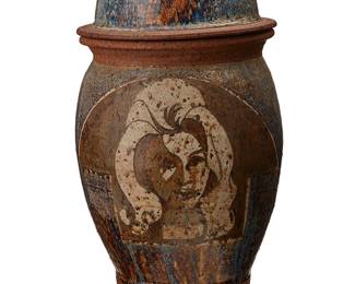 1453
Philip Cornelius (1934-2015)
An earthenware lidded jar, circa 1907
Signed to underside: C L
The jar with two female busts depicted in the glaze on a partial flambé ground
Overall: 22.5" H x 11.25" Dia.
Estimate: $400 - $600
