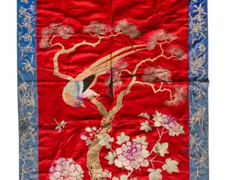 1409
20th century
A Chinese embroidered textile
A large pictorial panel featuring a pheasant and a spotted deer in a landscape with peony floral branches and a pine tree, all worked in multicolored embroidery on a red likely silk ground and with a blue silk border embroidered with floral and foliate motifs, and topped with a narrow red fabric panel edged with knotwork trim and multiple tassels, all with a plain cotton lining and pole sleeve to top edge
80" H x 35" W
Estimate: $300 - $500