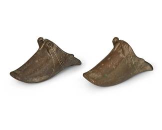 1440
18th/19th century; Peru
A pair of Spanish Colonial brass stirrups
One marked: FF 50; the other marked: FF 55
The conquistador stirrups with incised designs and squared toe, 2 pieces
Each: 5" H x 10.5" W x 4.625" D
Estimate: $50 - $100