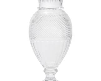 1338
Late 20th century
A Baccarat glass "Eurydice" vase
With etched Baccarat stencil mark; additionally etched to top of base: Musee des Cristalleries de Baccarat / 1821-1840 / Reproduction
The cut glass vase with flared rim and lobed neck above diamond motif and lobed body, raised on a circular foot
19" H x 8.25" Dia.
Estimate: $600 - $800