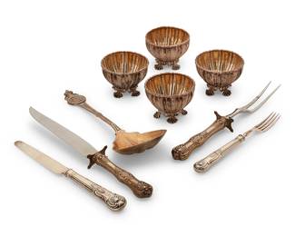 1327
1805-1833
A group of English sterling silver table items
Each marked for sterling and for London; flatware date marked for 1833 and for maker: WE [William Eaton]; salts date marked for 1805, with George III duty mark and maker's mark: IL [John Lautier]; serving spoon marked for Gorham
Comprising a hollow-handled flatware knife and fork service for six with carving set, and four open salts in custom case, together with a gilt-washed Gorham serving spoon in custom case, most personalized, 19 pieces
Largest Case: 3.5" H x 7.75" W x 6.75" D
Weighable sterling: 11.1 oz. troy approximately
Estimate: $400 - $600