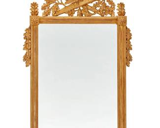 1497
20th century
A Louis XVI-style giltwood mirror
Stamped verso: 383 / Made in Italy
The giltwood frame with corner medallions, the sides mounted with leaves, surmounted by ornate openwork depicting two birds, a quiver of arrows, and foliate motifs
51" H x 31.5" W x 2.75" D
Estimate: $400 - $600