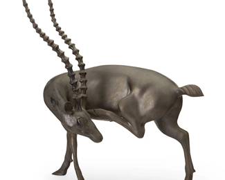 1456
20th century
A cast metal gazelle statue
Unmarked
The patinated and black-painted figure depicted with rear leg raised
23" H x 18.75" W x 10.5" D
Estimate: $200 - $300