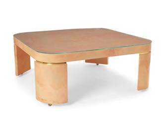 1466
Late 20th century
A Contemporary lacquered coffee table
In the manner of Karl Springer (1931-1991), the lacquered wood table with gold-toned accents at leg junctures, surmounted by a glass top
Overall: 19.625" H x 48" W x 48" D
Estimate: $400 - $600