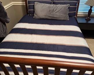 "Grow up Bed" Starts as a crib and the size of the bed changes into a full  frame Bed  -Grows with your Child 