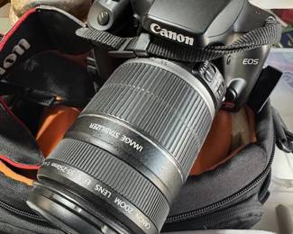 NIkon Camera with Lens and Camera Bag