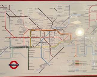 Map of London Underground also known as the tube framed in Red Metal