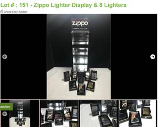 Lot # : 151 - Zippo Lighter Display & 8 Lighters
Display measures 5 1/2" x 16" without Zippo sign. Included are 8 Zippo lighters: High Polish Chrome 260 25 VINT HP CHR WO/SL, Brass Centerline 559 LOGO-Center Line, Golfer 250GLF Golfer, Deer 756 #250 DEER, Army Colt 1860 150 COLT ARMY 1860, Colt Vietnam M-16 150 COLT VIETNAM M-16, Zoro 205 Zoro, Indian Headdress. All are factory sealed with original box/keeper and paperwork.