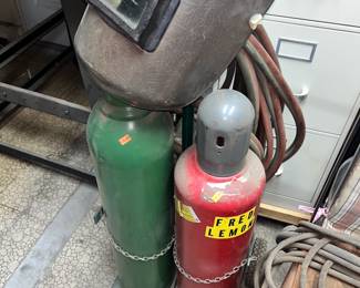 Two welding torches and helmet