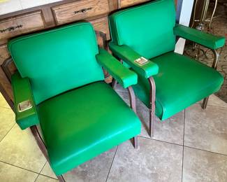 So cool! 1970s waiting room chairs in green vinyl with built-in ashtrays! 