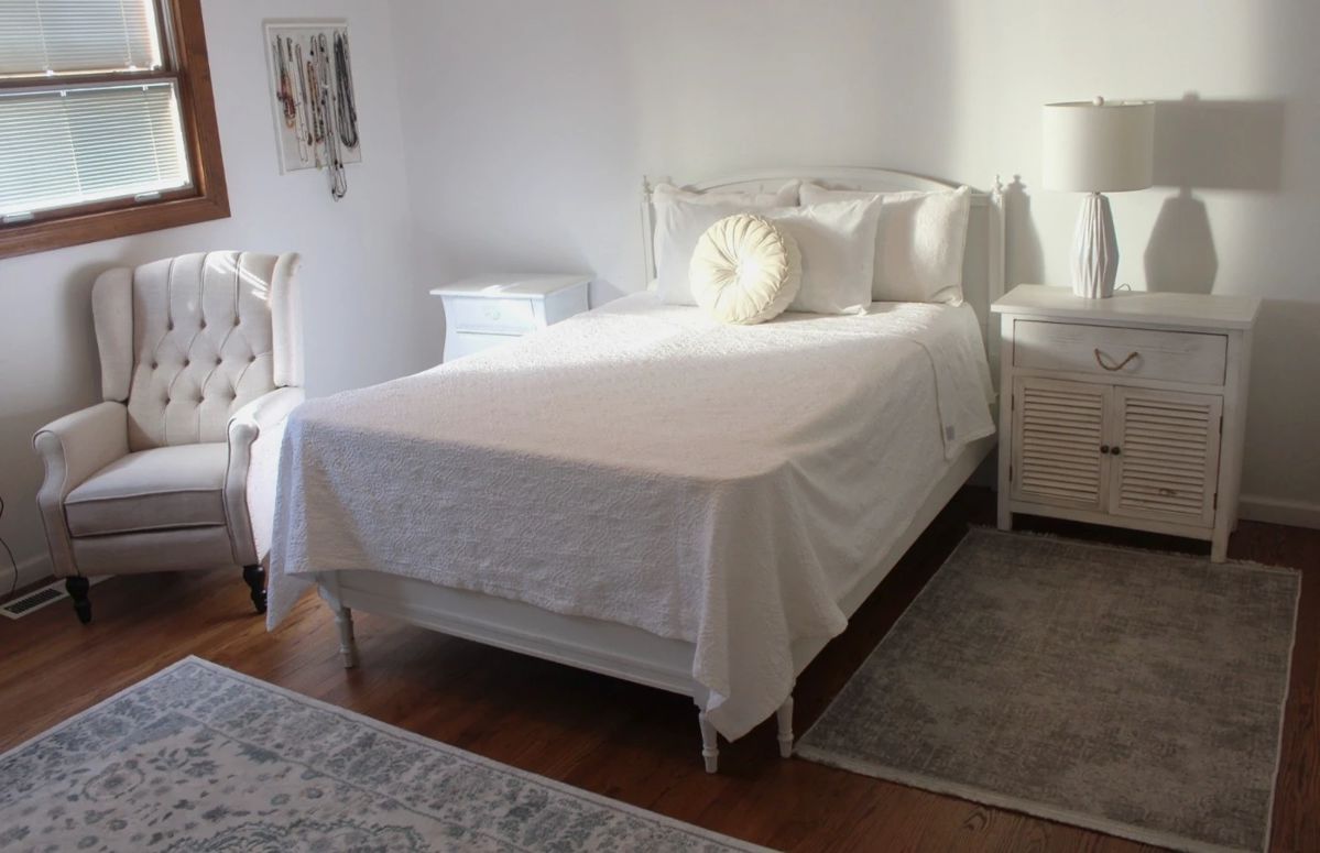 Room full of lovely furniture and decor. Antique white full size bed.  Includes Serta (Maple Grove) mattress and box spring.  With headboard 56"w x 46"h.  Footboard is 56"w x 28"h.