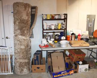 Area rug, various kitchen items.