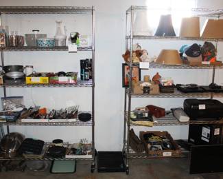 Adjustable wire shelves and variety of lamp shades, hp computer tower, monitor and keyboard. HP all in one printer, various kitchen.
