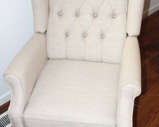 Linen colored recliner.