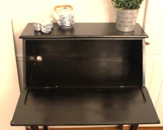 Black dropdown desk/cabinet 17"d x 32"w x 42"h.
