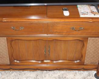 $75.00    Magnavox  phonograph player & radio.  (works)                        Cabinet dimensions: 18 1/2" d x 48" w x 29" h.
