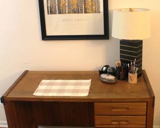 Three drawer desk.  23 1/2" d x 50" w x 30 1/2" h.