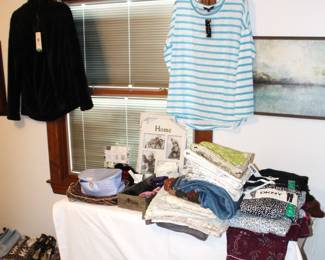 Many new with tags clothing, pillow covers and more.