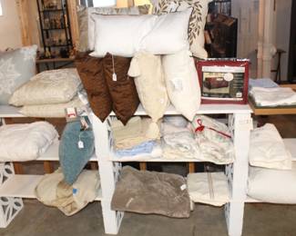 Variety of pillows and misc. linens.