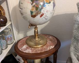 World globe and marble top table