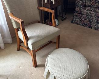 Lot (85)  Martha Washington style chair with matching skirted round 3-legged ottoman.