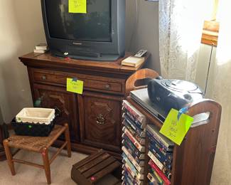 VHS tapes, TV and stand, CD player