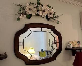 Mirrors and floral hanging items