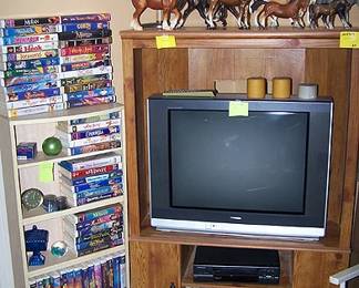 Breyer horses, VHS tapes, corner TV stand