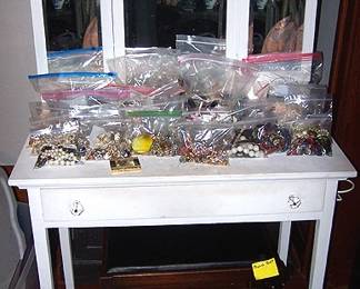 Vanity w/ tri fold mirror, bags of costume jewelry
