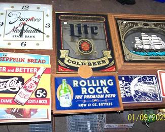 More advertising signs and clock