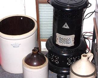 Crock and jugs,  washboard, stove