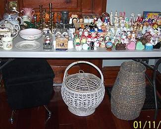 Salt and pepper collection, brass candlesticks, etc...